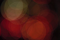 Subdued abstract photo with overlapping red, orange and white translucent circles Subdued abstract photo with overlapping red, orange and white translucent circles